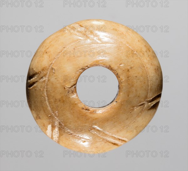 Spindle Whorl, 700s - 900s. Iran, early Islamic period, 8th - 10th century. Bone, incised; overall: 0.5 x 1.5 x 1.5 cm (3/16 x 9/16 x 9/16 in.)