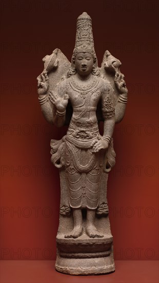 Vishnu, 900-950. South India, Tamil Nadu, probably Pudokkatai, early Chola Dynasty, 10th Century. Granite; overall: 129.5 x 38.1 cm (51 x 15 in.).