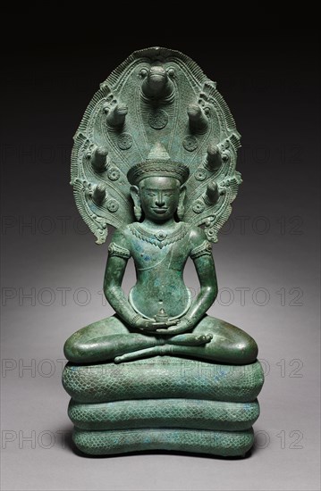 Naga-Enthroned Buddha, 1100s. Cambodia, Angkor, Angkor Wat Period, 12th century. Bronze; overall: 58.4 x 28 cm (23 x 11 in.).