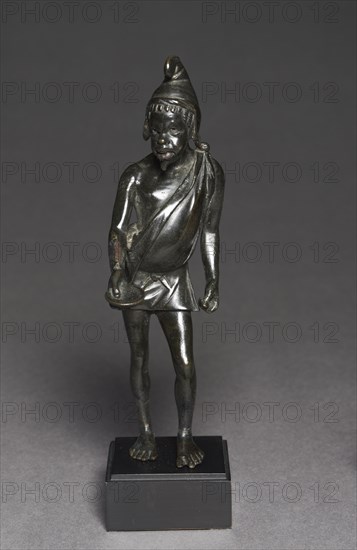 Statuette of a Beggar, 100-50 BC. Greece, Greco-Roman Period, late Ptolemaic Dynasty. Bronze, solid cast, with silver and copper inlays; overall: 18.4 x 5.3 x 7.2 cm (7 1/4 x 2 1/16 x 2 13/16 in.).