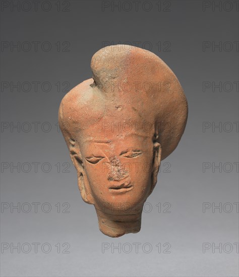 Head of a Woman, 14th-15th Century. Java, Majapahit Period (1294-1478). Terracotta; overall: 8.6 x 8 cm (3 3/8 x 3 1/8 in.).