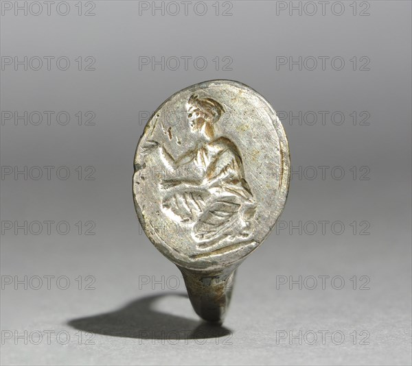 Finger Ring, 300s, or later. Greece, 4th Century (?), or later. Silver; diameter: 2 cm (13/16 in.); bezel: 0.8 x 1.4 cm (5/16 x 9/16 in.).