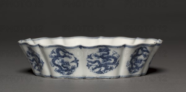 Brush Washer with Dragons, 1426-1435. China, Jiangxi province, Jingdezhen, Ming dynasty (1368-1644), Xuande reign (1426-1435). Porcelain with underglaze blue decoration; diameter: 18 cm (7 1/16 in.); overall: 4.5 cm (1 3/4 in.).