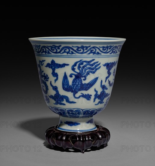 Cup with Dragons and Phoenixes, 1522-1566. China, Jiangxi province, Jingdezhen kilns, Ming dynasty (1368-1644), Jiajing mark and reign (1521-1566). Porcelain with underglaze blue decoration; diameter: 11 cm (4 5/16 in.); overall: 10.5 cm (4 1/8 in.).