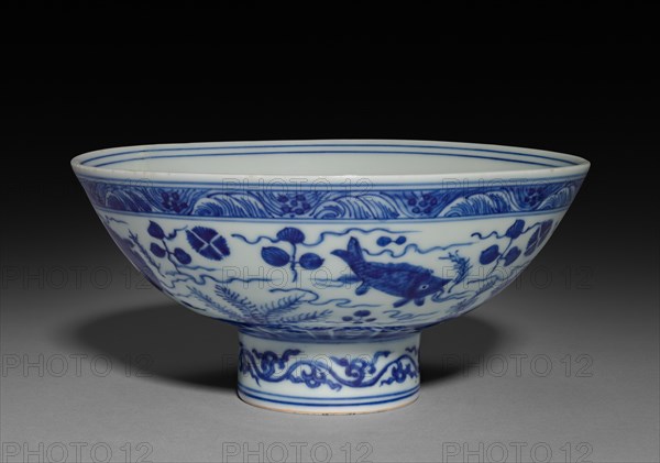 Bowl with Fish and Water Plants, 1522-1566. China, Jiangxi province, Jingdezhen kilns, Ming dynasty (1368-1644), Jiajing mark and reign (1521-1566). Porcelain with underglaze blue decoration; diameter: 16.1 cm (6 5/16 in.); overall: 7.8 cm (3 1/16 in.).