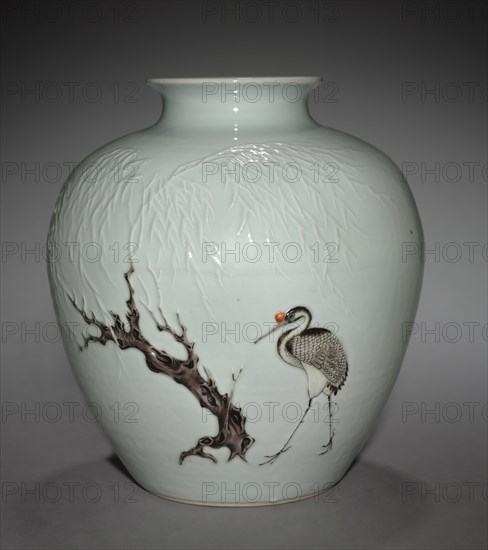 Jar with Crane and Willow in Relief, 18th Century. China, Jiangxi province, Jingdezhen kilns, Qing dynasty (1644-1911). Porcelain with raised and overglaze enamel; diameter: 20.5 cm (8 1/16 in.); overall: 22.3 cm (8 3/4 in.).