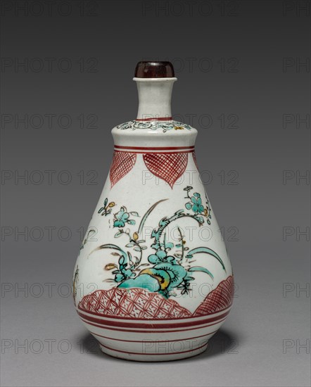 Wine Bottle with Plum and Pine Tree Design: Ko Imari Type, late 17th century. Japan, Edo Period (1615-1868). Porcelain with underglaze enamel decoration; diameter: 14.2 cm (5 9/16 in.); overall: 24.2 cm (9 1/2 in.).