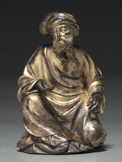 Kneeling Prophet from the Reliquary Chasse of Saint-Germain-des-Prés, 1409. Jean de Clichy (French), Gauthier du Four (French), and Guillaume Boey (French). Gilt bronze; overall: 13.8 x 9.3 x 8.7 cm (5 7/16 x 3 11/16 x 3 7/16 in.).