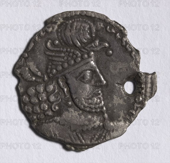 Drachma: Head of Hormizd II (obverse), 303-310. Iran, Sasanian, Reign of Hormizd II, 4th century. Silver; diameter: 2.3 cm (7/8 in.).