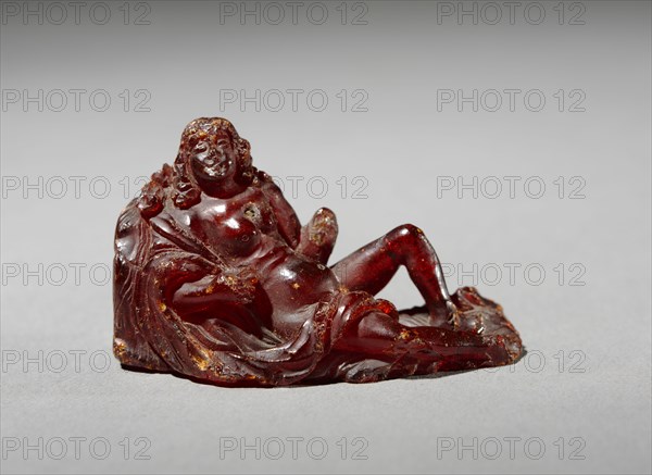 Statuette of a Reclining Woman, c. 100 BC - 100. Greece, Hellenistic period, 1st Century BC-1st Century AD. Amber; overall: 2.5 cm (1 in.).
