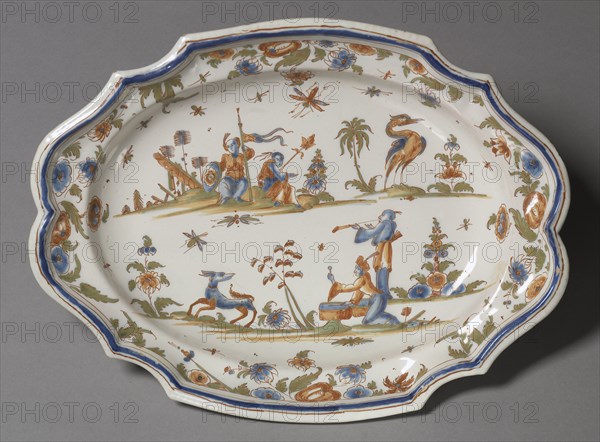 Platter, c. 1740. France, Lyons, mid-18th century. Tin- glazed eathenware (faience) with enamel decoration; overall: 36.2 x 27.3 cm (14 1/4 x 10 3/4 in.).