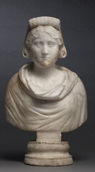 Portrait Bust of an Aristocratic Woman, 280-290. Later Roman, Asia Minor, early Christian period, 3rd century. Marble; overall: 33.4 x 18.5 x 10.7 cm (13 1/8 x 7 5/16 x 4 3/16 in.).