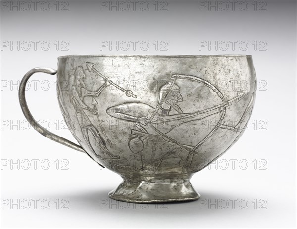 Lion Hunting Cup , 1100-1000 BC. Northwestern Iran, Amlash, 12th-11th century BC. Silver, raised, chased, repoussé; overall: 14 x 9.3 cm (5 1/2 x 3 11/16 in.).