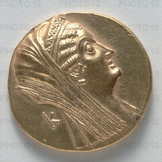 Octodrachm of Arsinoe II (obverse), 370-316 BC. Greece, Ptolemaic Dynasty, reign of Ptolemy V Epiphanes or Ptolemy VI Philometor. Gold; diameter: 2.9 cm (1 1/8 in.).