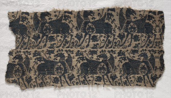 Fragment from Funeral Garment or Pall, 1100s. Iran ?, Seljuk period, 12th century. Compound tabby; silk; overall: 27.6 x 13.6 cm (10 7/8 x 5 3/8 in.).