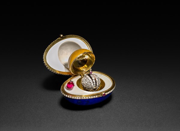 Lapis Lazuli Easter Egg with Crown and Ruby Egg Surprise, late 1800s - early 1900s. Firm of Peter Carl Fabergé (Russian, 1846-1920). Gold, enamel, lapis lazuli, pearls, diamonds, rubies; overall: 5.9 x 4.5 cm (2 5/16 x 1 3/4 in.).