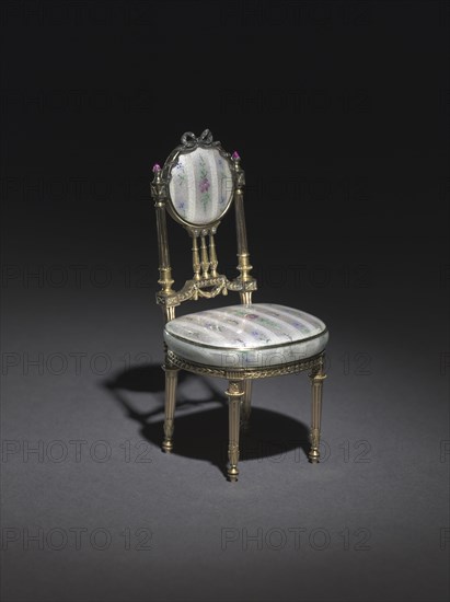 Miniature Chair, 1896-1906. Firm of Peter Carl Fabergé (Russian, 1846-1920). Gold, silver gilt, enamel over engine turned ground simulating brocaded textile, rubies, diamonds; overall: 10.5 x 5.3 x 4.8 cm (4 1/8 x 2 1/16 x 1 7/8 in.).