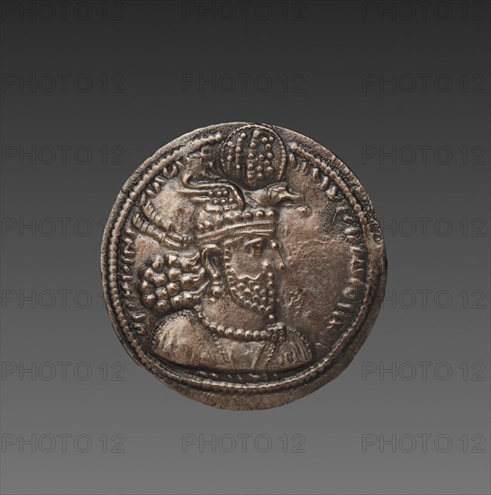 Drachma: Bust of Hormizd II (obverse), 303-309. Sasanian, Iran, reign of Hormizd II, 4th century. Silver; diameter: 2.6 x 0.1 cm (1 x 1/16 in.).