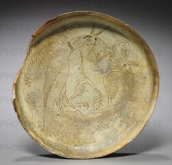 Deep Plate with Hawk, Rabbit, and Foliage, 1100s. Byzantium, 12th century. Sgraffito earthenware; diameter: 3.9 x 24 cm (1 9/16 x 9 7/16 in.)