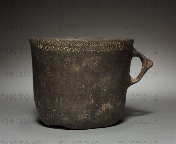 Drinking Vessel with Handle, c. 600. Argentina, Cienga Culture, early 7th Century. Earthenware; diameter: 16 cm (6 5/16 in.); overall: 12.8 x 20 cm (5 1/16 x 7 7/8 in.).