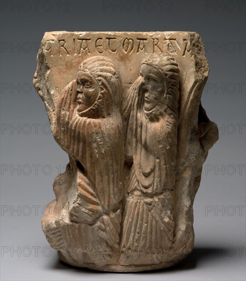 Fragment of a Double Capital: Mary and Martha at the Raising of Lazarus, 1145-1165. Southwest France, Ariège, region of Foix, mid-12th century. Quartz sandstone with traces of polychromy; overall: 30.2 x 22.9 x 17.2 cm (11 7/8 x 9 x 6 3/4 in.)