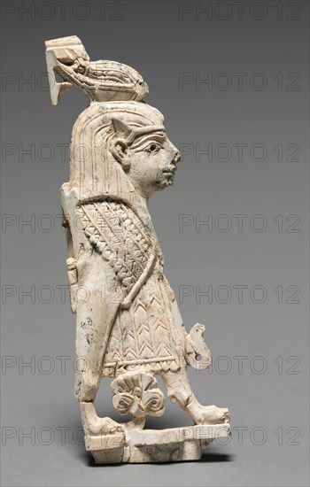 Decorative Plaque: Winged Sphinx, 900-800 BC. Phoenician, Iraq, Nimrud, 9th-8th Century BC. Ivory; overall: 16.1 x 5.5 x 1.1 cm (6 5/16 x 2 3/16 x 7/16 in.).