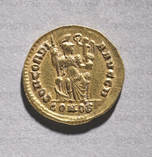 Tremissis of Honorius (reverse), 395-423. Byzantium, Ravenna, Byzantine period, late 4th-early 5th century. Gold; diameter: 1.5 cm (9/16 in.)