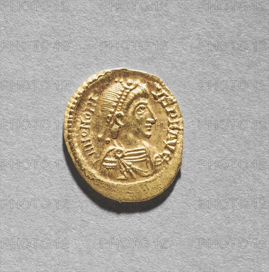 Solidus of Arkadios (obverse), 395-408. Byzantium, Constantinople, Byzantine period, late 4th-early 5th century. Gold; diameter: 2 cm (13/16 in.)