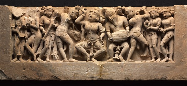 Frieze with Dancer and Musicians, c. 973. Northwestern India, Rajasthan, Sikar, Harshagiri, 10th century. Sandstone; overall: 33.4 x 95.3 x 11.3 cm (13 1/8 x 37 1/2 x 4 7/16 in.).