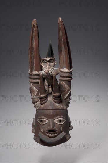 Helmet, late 1800s - early 1900s. Guinea Coast, Nigeria,Yoruba people, late 19th-early 20th century. Wood; overall: 62.9 cm (24 3/4 in.)