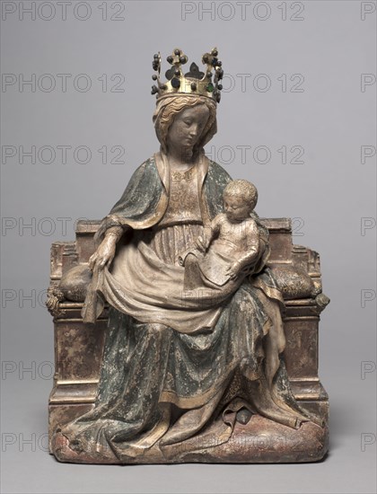 Enthroned Virgin with the Writing Christ Child, c. 1400. Franco-Netherlandish, active Paris(?), 15th century. Limestone with polychromy and gilding; overall: 44.8 x 31.5 x 15 cm (17 5/8 x 12 3/8 x 5 7/8 in.).