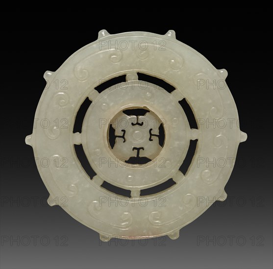 Ornament - Wheel, 1736-1795. China, Qing dynasty (1644-1912), Qianlong reign (1735-1795). White jade; diameter: 5.6 cm (2 3/16 in.).