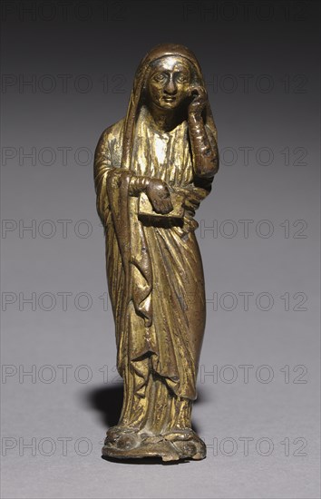 Mourning Mary, Probably from an Altar Cross, 1200-1300. Mosan, Valley of the Meuse, Gothic period. 13th century. Gilded bronze; overall: 10.2 x 3.3 cm (4 x 1 5/16 in.).