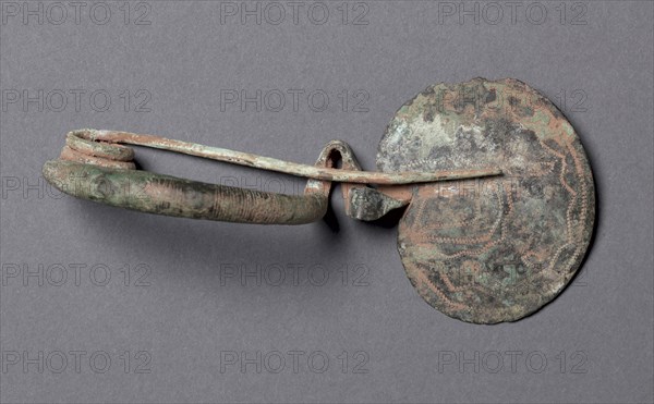 Plate Fibula, 900-700 BC. Italy. Bronze; overall: 11.1 cm (4 3/8 in.).