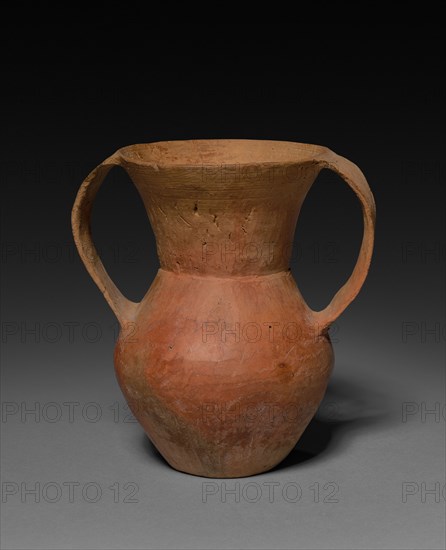Double-Handled Beaker, c. 2000-1500 BC. China, type-site at Qijiaping, Gansu province, Neolithic period, Qijia Culture. Burnished earthenware;
