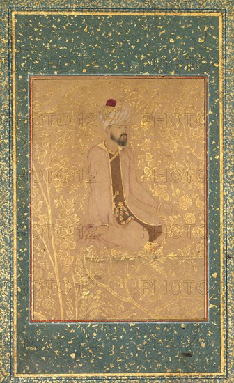 Seated Scholar, Border Fragment from the Teheran/Berlin album, c. 1605-1610. India, Mughal Dynasty (1526-1756). Color on paper; image: 10.3 x 7.5 cm (4 1/16 x 2 15/16 in.); overall: 21.5 x 15.6 cm (8 7/16 x 6 1/8 in.).