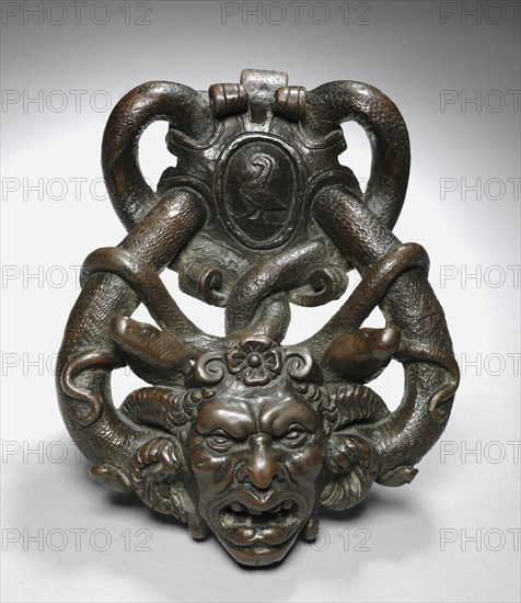 Doorknocker with Gorgon Head, mid 1500s. Italy, Venice, mid-16th century. Bronze ; overall: 25.4 x 19.7 x 6.9 cm (10 x 7 3/4 x 2 11/16 in.).