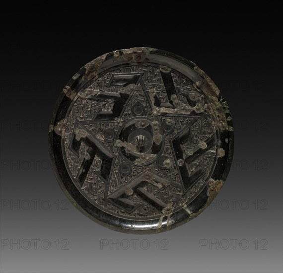 Mirror with 'Shan' (Mountain) Pattern, 3rd century B.C.. China, probably State of Chu, possibly Hunan province, Eastern Zhou dynasty (771-256 BC), Warring States period (475-221 BC). Bronze; diameter: 18 cm (7 1/16 in.).