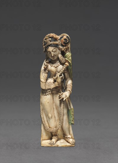 Female Attendant Bearing Fly-Whisk (Chauri), 8th Century. India, Kashmir, 8th century. Ivory; overall: 7.8 x 2.3 x 1 cm (3 1/16 x 7/8 x 3/8 in.); base: 2.2 x 2.3 cm (7/8 x 7/8 in.).