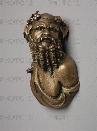 Silenus Bust for a Couch, 1-125. Italy, Roman, 1st to early 2nd Century. Bronze; diameter: 7.8 cm (3 1/16 in.); overall: 11 cm (4 5/16 in.).