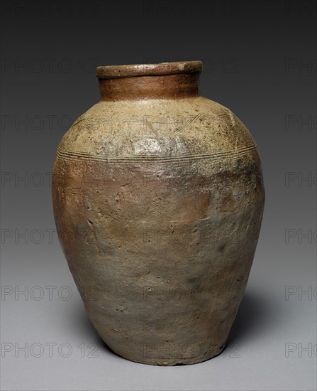 Jar with Incised Combed Shoulder Designs: Bizen Ware, Muromachi Period (1392-1573). Japan, Muromachi Period (1392-1573). Stoneware, ash glaze; diameter: 30.5 cm (12 in.); overall: 41.6 cm (16 3/8 in.).