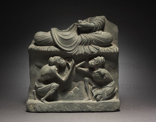 Base for a Seated Buddha with Figures of Ascetics, 2nd half of the 2nd Century. Pakistan, Gandhara, Kushan Period (1st century-320). Gray schist; overall: 38 x 36.2 x 9 cm (14 15/16 x 14 1/4 x 3 9/16 in.).