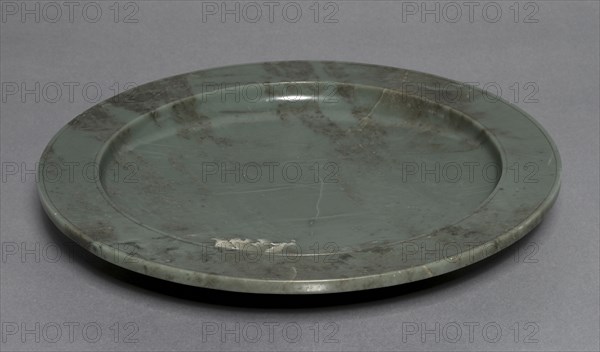 Footed Platter, 1600s. India, Mughal Dynasty (1526-1756). Nephrite (jade); diameter: 41.1 cm (16 3/16 in.).