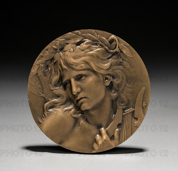 Medal Presented to Loïe Fuller by the French Government:  Orpheus at the Entrance to the Underworld (obverse). Marie Alexandre Lucien Coudray (French, 1864-1932). Bronze; diameter: 7 cm (2 3/4 in.).