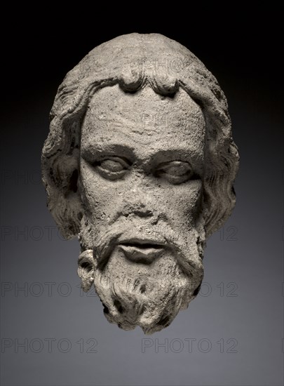 Head of an Apostle from the South Portal of the Cathedral of Thérouanne, c. 1235-1240. Northern France (Pas-de-Calais), Thérouanne, 13th century. Oolitic limestone; overall: 47.6 x 31.8 x 37.8 cm (18 3/4 x 12 1/2 x 14 7/8 in.).