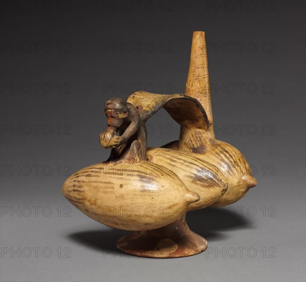 Stirrup Jar with Monkey and Three Fruits, 1000 or later. Peru, North Coast. Red earthenware decorated with cream-colored slip and brown pigment; overall: 20.4 x 19 x 14.6 cm (8 1/16 x 7 1/2 x 5 3/4 in.).