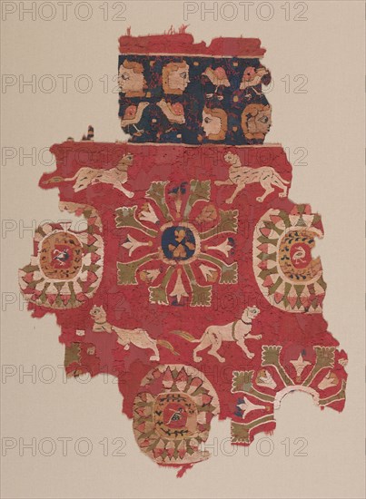 Curtain Fragment with Panthers, 500s. Egypt, Antinoë, Byzantine period, late 6th century. Slit-tapestry weave; dyed wool, undyed linen; overall: 76.2 x 54.6 cm (30 x 21 1/2 in.); mounted: 87.6 x 66 x 2.5 cm (34 1/2 x 26 x 1 in.)