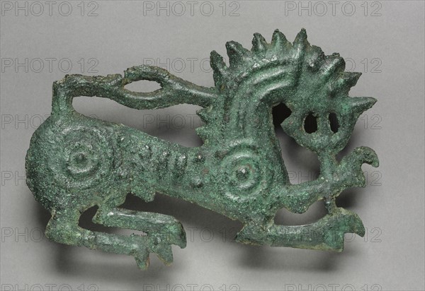 Lion Plaque, 1000-500 BC. Iran, Scythian, 1st half 1st millennium BC. Bronze, repoussé ; overall: 13.5 x 18 x 1 cm (5 5/16 x 7 1/16 x 3/8 in.).