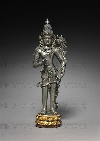 Bodhisattva Maitreya: The Future Buddha, 1100s. East India, Bengal, Pala period, 12th century. Silver inlaid with turquoise, copper, brass and gold; gilt bronze lotus; overall: 32.4 cm (12 3/4 in.).