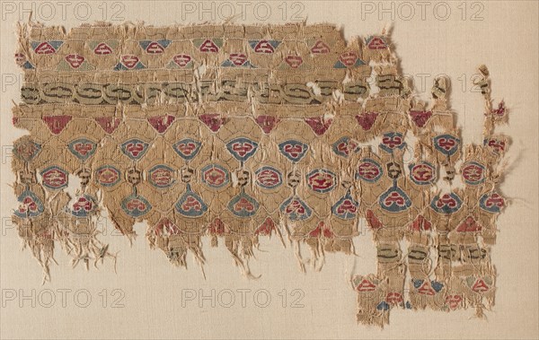 Fragment of a Tiraz-Style Textile, 1100s. Egypt, Fatimid period, 12th century. Tapestry (originally inwoven in a tabby ground); linen and silk; overall: 13.8 x 22.5 cm (5 7/16 x 8 7/8 in.)